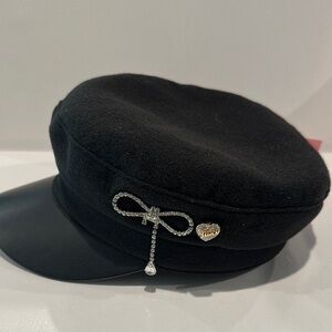 NWT Juicy Couture Black Cap with Silvertone Jewel and Juicy Heart on the side.
